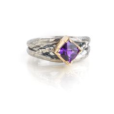 Gold, Silver & Stone Ring - This sterling silver ring has an organic twig design and dazzles with a single, 6x6mm checkerboard-cushion-cut amethyst set in 14k yellow gold. This one-of-a-kind ring is available in quarter sizes 510. Silver Stone Ring, Amethyst Set, Twig Ring, Artful Home, Stone Ring, Cushion Cut, Stone Rings, Sterling Silver Ring, Silver Ring