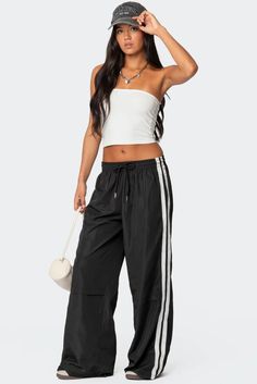 Fauna Nylon Track Pants – edikted Striped Sportswear Bottoms For Sports, Striped Sporty Bottoms For Sports, Sporty Striped Bottoms For Sports, Sporty Striped Sports Bottoms, Sporty Summer Cargo Pants With Drawstring, Sporty Pants With Functional Drawstring, Sporty Nylon Pants With Drawstring, Nylon Long Pants With Functional Drawstring, Summer Nylon Drawstring Pants