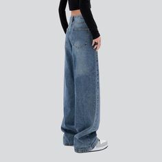 Vintage blue women's baggy jeans online—excellent jeans from the 2023 Spring-Summer collection. Street-style trend denim is a fashion style that focuses on the individual's personal expression and unique look. This style celebrates the freedom of self-expression and gives people a chance to make a statement with their clothing choices. It combines classic denim designs with modern trends, allowing for timeless pieces and more personalized looks. Denim in the street-style movement is ideal for pe Women Baggy Jeans, Blue Baggy Jeans, Jean Jacket Patches, Street Trends, Street Style Trends, Loose Jeans, Love Vintage, Current Fashion Trends, Jeans Online