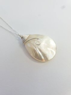 These beautiful necklaces are made from real Mother of Pearl shell on the sterling silver chain. Beautiful as a Bride's Jewelry or as a Bridesmaid's Gift. The perfect choice for a unique dainty gift to your mother, daughter, best friend or just because you deserve it. Each item is carefully packaged in an elegant jewelry box. If you would like to add a personalized note with your order, just write a note at checkout and I will send a small card with your gift to the recipient. If you need a bigg Beach Wedding Jewelry, Daughter Best Friend, Necklace Shell, Mother Of Pearl Pendant, Pearl Beach, Beach Necklace, Beach Necklaces, Mother Of Pearl Necklace, Shell Necklace