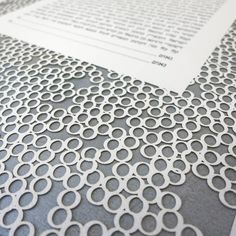 a close up of a paper with circles on it