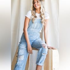 New In Trending Distressed Denim Overalls With Pockets Loose Fit 100% Cotton Hand Wash/Delicate Cycle. Hang Dry S M L Xl Trendy Light Wash Distressed Denim Jumpsuit, Trendy Distressed Light Wash Denim Jumpsuit, Casual Ripped Light Wash Denim Jumpsuit, Casual Light Wash Ripped Denim Jumpsuit, Casual Light Wash Distressed Denim Jumpsuit, Casual Distressed Light Wash Denim Jumpsuit, Distressed Denim Jumpsuit In Dark Wash, Casual Dark Wash Ripped Denim Jumpsuit, Relaxed Fit Distressed Denim Jumpsuit