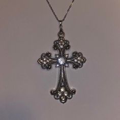 Baroque Silver Crystal Cross Necklace ⋆｡‧₊o♱༺𓆩❦︎𓆪༻♱༉.   Each order comes w/ a gift †   18" length stainless steel chain with 2" extender ⛓️   Handmade in NY ❤️🔥   o Feel free to DM about any item Spiritual Cross Necklace With Silver Chain For Gift, Metal Cross Necklace With Adjustable Chain For Gifts, Silver Cross Necklace With Large Pendant, Elegant Silver Metal Cross Necklace, Silver Pendant Cross Necklace As Gift, Elegant Silver Chain Cross Necklace Gift, Elegant Silver Cross Necklace With Round Pendant, Elegant Silver Cross Charm Necklaces, Silver Chain Cross Pendant Necklace Gift