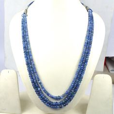 Welcome to Hari Om Gems and Jewels Natural Tanzanite Beads Necklace Total Carat Weight - 330 Cts Length - 16 to 17 Inches Beads Size - 3 - 8 MM Natural / Lab Created - Natural Shape - Round Cabochon Quality - AA++ Finest Quality Color - Blue Product No. - 4 Certificate No. : 05310 (Track it on www.internationalgemologicalcenter.com) Shipping and Handling:- Handling Time: We take handling time of 1-2 Business Day from the date of receipt of the payment after receiving cleared payment. Shipping Services: The shipping company takes 6-20 business days via Registered mail to deliver the product at US And 8-20 days for International Shipping apart of USA. This transit time does not include the seller's handling time. Transit time includes normal weekdays. Often Saturdays, Sundays, and major holi Blue Faceted Oval Beads Jewelry, Blue Kyanite Gemstone Beaded Necklace, Blue Kyanite Gemstone Bead Necklaces, Blue Kyanite Round Bead Jewelry, Blue Kyanite Gemstone Beads Jewelry, Blue Kyanite Jewelry With Gemstone Beads, Blue Round Gemstone Beads, Blue Oval Beads Gemstone Jewelry, Blue Rondelle Gemstone Beads