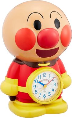 an alarm clock with a cartoon character holding it's hands in the shape of a pig