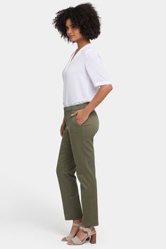 NYDJ's Sadie Slim Pants in soft stretch twill are an absolute closet staple. Polished and sophisticated, they'll elevate your look every time. Features front slash pockets, back welt pockets, belt loops and a zip fly with hidden button closure. This pant is made with earth-friendly methods that result in reduced consumption of water, chemicals and/or energy. | NYDJ Women's Sadie Slim Pants in Avocado, Regular, Size: 8 Avocado Green, Elevate Your Look, Petite Outfits, Earth Friendly, Slim Pants, Bottom Clothes, Personal Marketing, Welt Pockets, Welt Pocket