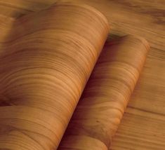 a close up of a wooden surface with some wood grain on the top and bottom