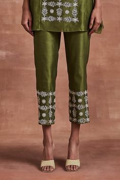 Olive green kaftan top adorned with beige silk thread and patri embroidery. Comes with coordinating pant and inner. - Aza Fashions Green Kaftan, Kaftan Top, Beige Silk, Top And Pants Set, Silk Thread, Pants Pattern, Pant Set, Embroidered Silk, Set For Women