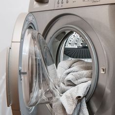 a washer and dryer sitting next to each other