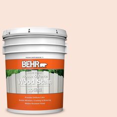 a white paint bucket with the words behrr house of greene wood stain on it