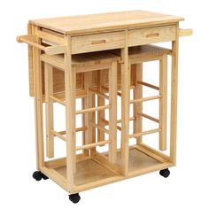 a wooden table with two drawers on wheels