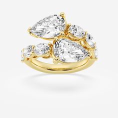 This striking pear diamond bypass ring redefines killer curves. Lustrous lab grown pear shaped diamonds in a striking east-west setting are complement Mom Ring, Bypass Ring, Pearl And Diamond Earrings, Dream Engagement, Dream Engagement Rings, Jewelry Rings Diamond, Pear Diamond, Fashion Ring, Pear Shaped Diamond