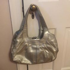 In Great Condition! Small Stains On The Interior Which Are Shown Tons Of Pockets! Comes With A Cross Body Strap Silver Tote Evening Bag For Everyday, Gold Coach Bag For Daily Use, Coach Gold Top Handle Shoulder Bag, Gold Coach Top Handle Shoulder Bag, Gold Top Handle Shoulder Bag By Coach, Gold Satchel Hobo Bag For Formal Occasions, Gold Top Handle Shoulder Bag For Errands, Gold Coach Bags For Everyday, Elegant Silver Coach Bag