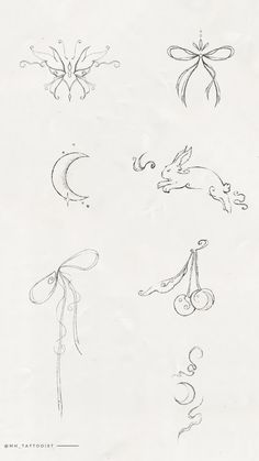 several drawings of different shapes and sizes on paper