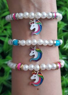 Girls love unicorns bracelets, these bracelets are perfect for party favors, prizes or any occasion gifts. They comes in 3 styles, silver with pink, gold with pink and silver with blue. They come in a little bag ready to give.  You can buy just one or enjoy the discount when you buy set of 3 or set of 5. The length of the bracelets are 6.5 inches, if you prefer them smaller or a little bigger, please send me a message. For more favors and beautiful gifts, follow me @beautifulgiftsbyVg on Instagram and Facebook For any questions feel free to send me a message. Birthday Package, Unicorn Bracelet, Unicorn Jewelry, Girls Personalized Gifts, Unicorn Party Favors, Elephant Bracelet, Mermaid Gifts, Mermaid Jewelry, Kids Bracelets