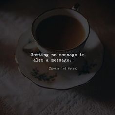 a cup of coffee sitting on top of a saucer with the quote getting no message is also a message