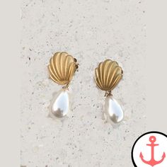 Pearl Shell Dangle Earrings: Uniquely Elegant Accessories for Ocean Admirers Step into the world of coastal chic with our stunning Pearl Shell Dangle Earrings. These exquisite pieces of nautical jewelry perfectly capture the beauty and allure of the sea, making them the ideal accessory for passionate sea lovers. Indulge in the enchantment of the ocean with these earrings, which are part of our Shell Earrings Collection. Features of Pearl Shell Dangle Earrings based on Traditional Artistry Authen Pearl Dangle Earrings, Nautical Jewelry, Coastal Chic, Pearl Earrings Dangle, Pearl Shell, Shell Earrings, Stunning Earrings, Elegant Accessories, Gold Earrings Dangle