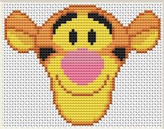 a cross stitch pattern with a smiling face