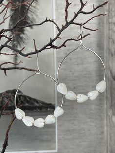 "Hawaiian Mother of Pearl 10 Pikake & 14K Gold Filled or 925 Silver Hoop earrings * 2.25\" long x 1.25\" Hoop diameter  10 mini Natural White mother of pearl Pikake.  925 Silver or 14K gold filled handmade smooth polished hoops  This is quality Mother of Pearl which reflects light when you move it around Made with Aloha by me. Mahalo and enjoy!" White Nickel Free Hoop Earrings, White Sterling Silver Hoop Earrings, Small White Hypoallergenic Hoop Earrings, Adjustable White Hoop Earrings For Anniversary, White Small Hoop Hypoallergenic Earrings, Everyday White Teardrop Hoop Earrings, White Hypoallergenic Hoop Earrings, Hypoallergenic White Hoop Earrings, White Teardrop Hoop Earrings Nickel Free