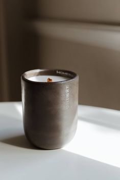 Mood: Warm + Cozy Homebody offers a consummate combination of tobacco and santal, evoking an ambience of comfort with its whispers of vanilla. handcrafted candle in cement vessel Cozy Candle, Cement Candle, Wooden Wick Candles, Candle Supplies, Cozy Candles, Aroma Candle, Wick Candle, Wooden Wick, Body Cleanser