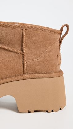 Cannot be shipped outside the USAUpper: Cowhide suedeChunky heelNo closure, pull-on designRound toeRubber soleImported, VietnamThis item cannot be gift-boxedStyle #UGGGG30296 Brown Ugg Boots, Chestnut Boots, Chestnut Uggs, Ugg Classic Ultra Mini, Ugg Classic, Platform Boots, Chunky Heel, Suede Boots, Ugg Shoes