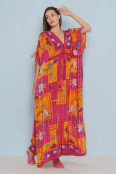 Pink kaftan with multi colored floral chintz patterns all-over. - Aza Fashions Multicolor Printed Dresses For Vacation, Orange Bohemian Kaftan With Floral Print, Bohemian Multicolor Printed Maxi Dress, Summer Orange Floral Print Kaftan, Bohemian Kaftan With Floral Print And Kimono Sleeves, Bohemian Maxi Kaftan With Floral Print, Bohemian Orange Dress With Printed Motifs, Festive Floral Print Beach Dresses, Multicolor Boho Print Kaftan With Kimono Sleeves