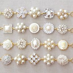 Vintage White Pearl Bracelet For Anniversary, White Pearl Button Wedding Jewelry, White Wedding Jewelry With Pearl Details, Gold Bracelets With Vintage Charm For Wedding, Gold Vintage Charm Bracelets For Wedding, Pearl White Wedding Jewelry With Pearl Buttons, Vintage Pearl Bracelet For Wedding, Vintage White Bracelets For Wedding, Elegant Wedding Bracelets With Vintage Charm