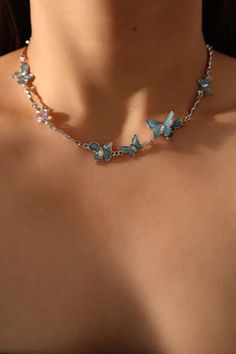 Blue Butterfly Fluttering Necklace Luxury Blue Flower Pendant Necklace, Trendy Butterfly-shaped Party Jewelry, Trendy Butterfly Jewelry For Parties, Trendy Butterfly Necklaces For Party, Elegant Blue Butterfly Jewelry, Light Blue Clavicle Chain Necklace, Trendy Light Blue Party Jewelry, Trendy Light Blue Jewelry For Party, Blue Clavicle Chain Jewelry For Parties