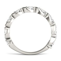 A moissanite swirl band celebrates your journey with contemporary design sure to take their breath away. Meticulously crafted in 14k white gold, this modern setting showcases nine round fiery moissanite gemstones for brilliance that lasts a lifetime.\nThrough a patented growing method, Forever One by Charles & Colvard offers accessible luxe jewelry with superior colorless to near-colorless lab-created moissanite gemstones. Each piece features unsurpassed craftsmanship meeting the most exacting s Modern White Gold Diamond Ring With Halo Design, Modern White Gold Eternity Band With Prong Setting, Modern White Gold Eternity Band With Brilliant Cut, Modern White Gold Eternity Band With Round Cut, Modern Twist Diamond Jewelry With Round Band, Modern Twist Diamond Ring With Prong Setting, Modern Twist Diamond Ring With Round Cut, Modern Twist White Diamond Ring, Modern Silver Diamond Ring With Lab Grown Diamond