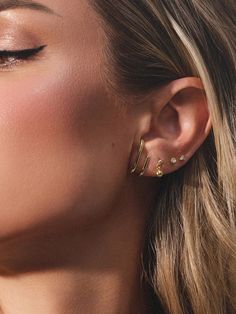 Stay ahead of the trend with our Double Vision Ear Climber that’ll definitely turn heads. These climber earrings are designed with a two-in-one illusion, appearing to be two separate linear stud earrings from the front when really you only need one piercing. Not only are these the suspender style you’ve been looking for, but our original style is even decorated with cubic zirconia for a bit of added glitz. Did we mention they also come in Sterling Silver? | Gold Solid Double Vision Ear Climber E Trendy Everyday Ear Climbers, Uncommon James, Double Vision, Ear Climbers Earrings, Ear Climber, Ear Climbers, Climber Earrings, Jewelry Cleaner, The Trend