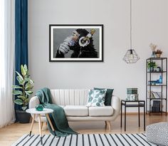 a living room filled with furniture and a painting on the wall