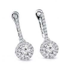 Halo Diamond earrings with tear drop design. Consists of 0.30ct round brilliant cut center diamond on each earring. Surrounded by 0.20ct round cut side diamonds on each earring. The center has a 4-prong setting and the side diamonds are in a pave setting. The diamonds are graded as SI Clarity and G-H Color. Handcrafted in 14k White Gold. Queen Rings, Halo Diamond Earrings, Discount Poster, Food Coupon, Drop Design, Halo Setting, Pave Setting, Drop Dangle Earrings, Diamond Drops