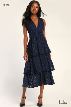 You'll be the star of the show every time when you wear the Lulus Make It Mesmerizing Navy Blue Jacquard Tiered Midi Dress! Lightweight woven chiffon, with an eye-catching floral-inspired jacquard pattern throughout, shapes this darling dress. Wide tank straps support a V-neck bodice with a gathered waist and a V-back crossed by a single tie. Tiered skirt cascades down to a mini hem. Hidden zipper/clasp at back. Fit: This garment runs small - please size up. Length: Mid-calf length. Size medium Tiered Midi Dress For Night Out, Navy Midi Dress For Spring Party, Navy Ruffled Dress For Party, Navy Party Dress With Ruffles, Navy Blue Midi Dress, Lulu Fashion, Adhesive Bra, Darling Dress, Tiered Midi Dress