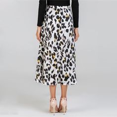 Gender: Women Model Number: skirt180730402 Waistline: Natural Material: Polyester Silhouette: Asymmetrical Pattern Type: Print Dresses Length: Mid-Calf Decoration: NONE Style: Casual Fabric : Fabric has no stretch Color: Multicolor UID: 180821237 Style: Casual Silhouette: Shift Season: Summer Waist Type: Mid Waist Material: 100% Polyester Length: Mid-Calf Occasion: Weekend Casual Decoration: Knot Pattern Type: Leopard White Non-stretch Knee-length Skirt, Non-stretch Midi Length Skirt, White Fitted Maxi Skirt For Fall, White Lined Maxi Skirt For Fall, White Flared Maxi Skirt For Fall, White Maxi Skirt For Fall, White Knee-length Skirt For Fall, Trendy White Maxi Skirt For Day Out, Casual White Maxi Skirt For Party