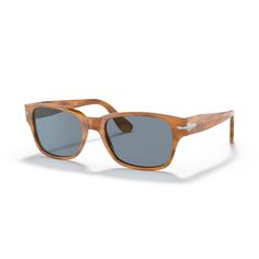 From the rich coloring to the masculine shape, Persol's 3288S delivers a classic summer accessory. The Italian-made sunglasses feature a sleek silhouette that combines a square acetate frame and varying shades of brown. Its warm Havana hue is paired with blue-tinted crystal lenses, while the temple is branded with Persol's signature arrow. The brand's trademark Meflecto system is hidden inside, delivering flexible comfort for all-day wear. Classic Square Frame Sunglasses For Summer, Classic Brown Sunglasses For Summer, Classic Sunglasses With Tinted Lenses For Beach, Classic Tinted Sunglasses For Beach, Classic Wayfarer Sunglasses For Beach, Classic Square Frame Sunglasses For Beach, Classic Square Frame Sunglasses With Uva Protection, Classic Sunglasses With Uva Protection And Square Frame, Classic Polarized Square Frame Sunglasses