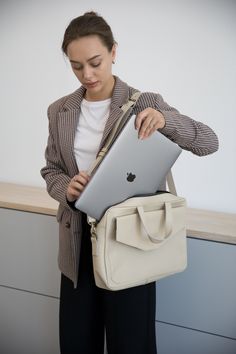 Introducing our women's leather laptop bag, the perfect blend of style and functionality. Designed specifically for women, this laptop tote bag is crafted from luxurious leather, allowing you to carry your laptop in utmost elegance.  Whether you're heading to the office or a business meeting, this leather laptop bag is a must-have accessory that combines practicality with timeless sophistication. Upgrade your professional look with our women's leather laptop bag today. Optionally, you can make c Luxury Briefcase For Business, Luxury Leather Briefcase For Gift, Versatile Laptop Bag With Removable Pouch For Work, Modern Laptop Bag With Removable Pouch For Work, Large Capacity Laptop Bag For Daily Use, Trendy Travel Laptop Bag With Sleeve, Large Capacity Business Laptop Shoulder Bag, Classic Office Laptop Bag With Removable Pouch, Workwear Laptop Satchel With Removable Pouch