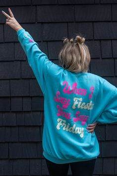 Fiesta Friday crewneck sweatshirt. This trendy sweatshirt with back print is a must for Fiesta Fridays! Pair with the Fiesta Friday kid's hoodie for the coolest matching mom & kid outfits. Shop the full Krista Horton x Slyfox collection for more trendy mom sweatshirts, matching family sweatshirts & everything you need to achieve the ultimate cool mom aesthetic. This one's great for non-mom's too! Size Reference: Krista is wearing a size XL Blue Oversized French Terry Sweatshirt, Oversized Blue French Terry Sweatshirt, Trendy Blue Cotton Sweats, Blue Graphic Print Sweats For Streetwear, Blue Sweats For Fall Streetwear, Blue Sweats For Streetwear In Fall, Blue Fleece Sweatshirt With Graphic Print, Trendy Blue Fleece Sweatshirt, Blue Relaxed Fit Sweats With Letter Print