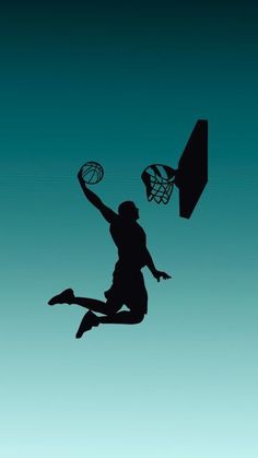 the silhouette of a basketball player is jumping up into the air