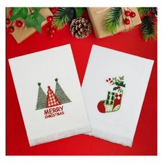 two christmas napkins on top of each other