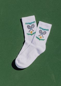 Advantage: you. The Centre Court Crew, knit with a grand crest on either side of the leg, is a perfect companion on grass or on clay. Sans the A.T. branded rackets for this summer, these three crew length socks are absolutely smashing, certified winners, right down the line. Casual Sports Socks For Spring, Sporty Spring Streetwear Socks, American Trench Socks, Socks, Navy