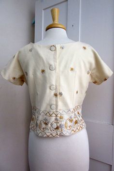 "White Wool with Gold and Silver Embroidery 5 covered button in back Lined Size Bust - 38\" Waist - 32\" Arm from Neck - 8.5\" Length - 18\" Condition - Excellent" Gold And Silver Embroidery, Silver Embroidery, Wool Top, Vintage Wool, Blouse Top, Gold And Silver, Chef's Jackets, Blouses For Women, Top Blouse