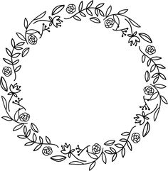 a black and white circular frame with flowers on the inside, surrounded by smaller leaves