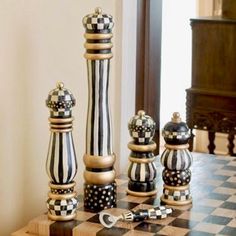 a chess board with black and white pieces on it