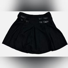 Women's Black Hot Topic Skirt With Buckles & Pleats. Size Large. Has The Plastic Price Ring, But The Price Tag Has Been Removed. Super Cute! I Have Matching Tops From Hot Topic As Well! Waist Measures 16" & Length 16". Casual Black Mini Skirt For Alternative Fashion, Black Skort For Alternative Fashion In Spring, Black Skort For Spring Alternative Fashion, Black Grunge Skort For Spring, Black Cotton Mini Skirt For Fall, Rock Style Cotton Skirt For Spring, Spring Cotton Rock Style Skirt, Black Punk Cotton Mini Skirt, Black Cotton Punk Mini Skirt