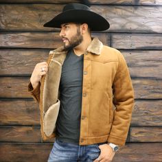 This Mens Suede Trucker Jacket mixes the old west with contemporary fashion. Made out of faux suede, this jacket has a snap front storm flap. Two side-entry pockets give it an authentic Western look. Throw this jacket on over anything and for warmth and an authentic western look. Zipper and snap closure Adjustable snap sleeves Soft faux shearling lining and collar Western Style Winter Outerwear With Snap Buttons, Winter Outerwear With Pockets For Rodeo, Winter Rodeo Outerwear With Pockets, Western Style Winter Outerwear For Rodeo, Western Winter Outerwear For Rodeo, Western Winter Outerwear For Ranch, Brown Winter Outerwear For Rodeo, Western Style Suede Winter Outerwear, Western Style Brown Leather Jacket For Winter