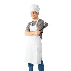 a man wearing an apron and holding a spatula