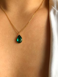 PINE DROP * 18K gold plated teardrop necklace  * Golden s.Steel chain 1.5mm * Teardrop pendant 11x17 mm * Glass crystal teardrop in deep green * Adjustable 45-50 cm * 100% good vibes! Cheap Gold Teardrop Necklace, Luxury Green Teardrop Drop Necklace, Cheap Green Teardrop Necklace, Luxury Teardrop Gemstone Necklace, Luxury Teardrop Nature-inspired Necklaces, Luxury Teardrop Necklace With Natural Inclusions, Luxury Nature-inspired Teardrop Necklace, Cheap Gold Teardrop Drop Necklace, Affordable Gold Teardrop Pendant Necklace