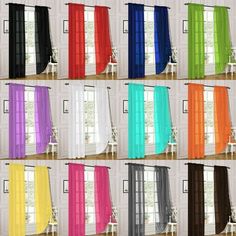 multiple colors of sheer curtains hanging on the wall