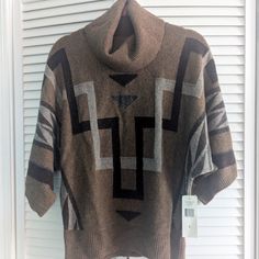 Cowl Neck, Partial Wide Sleeve, Brown/Camel/Tan Geometric Pattern, Lambswool Blend Never Worn Cozy Brown Wool Tops, Ralph Lauren Fitted Sweater For Fall, Fitted Ralph Lauren Sweater For Fall, Ralph Lauren Knit Tops For Fall, Ralph Lauren Fall Sweater, Ralph Lauren Beige Outerwear For Fall, Blanket Western, Coffee Brown Color, Aztec Blanket