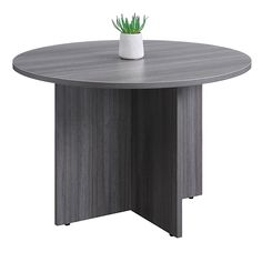 a round table with a plant on top